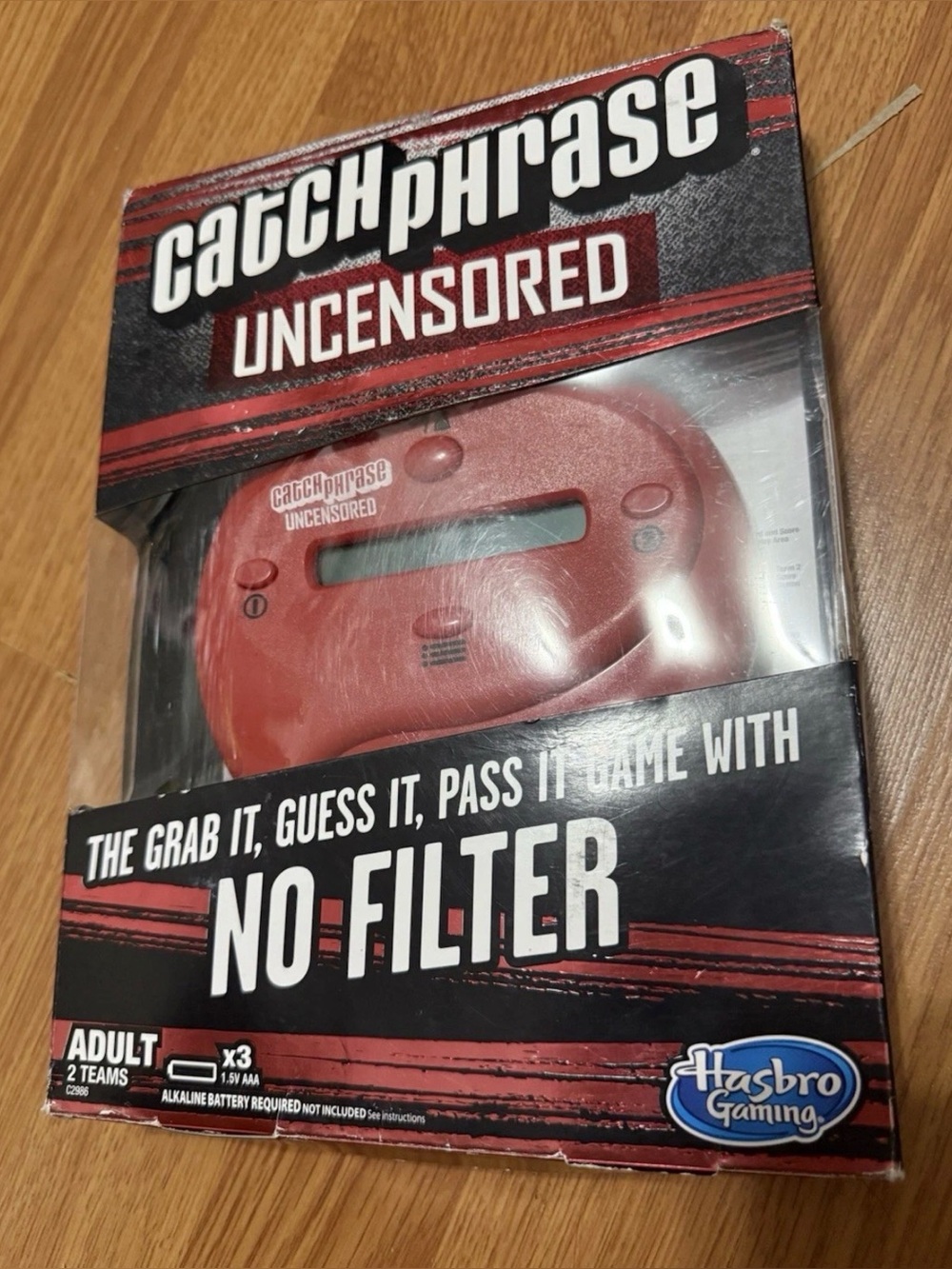 Hasbro Catch Phrase: Uncensored Adult Handheld Party Game, Red Electronic Tested